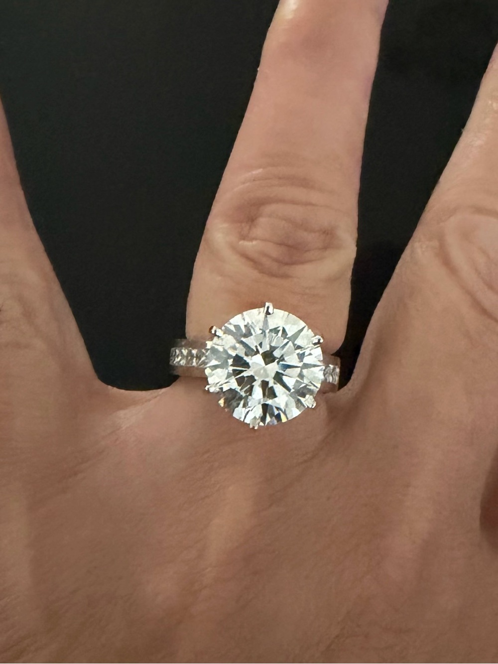 6.06 VVS2 Carat round Lab Diamond solitaire ring with 2 Carats of side diamonds!